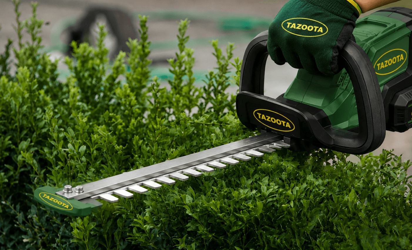 Lawn mower in use on a landscaped yard